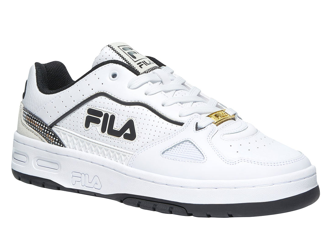 Tenis FILA Teratach 600 color blanco con detalles en negro y beige, vista lateral.