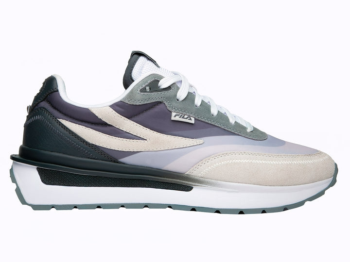 Tenis FILA en tonos gris nimbus, glaciar y sombra oscura con suela blanca y detalles en gamuza.