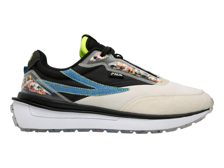 Tenis FILA en colores crema y negro con detalles azules y amarillos y suela blanca gruesa.