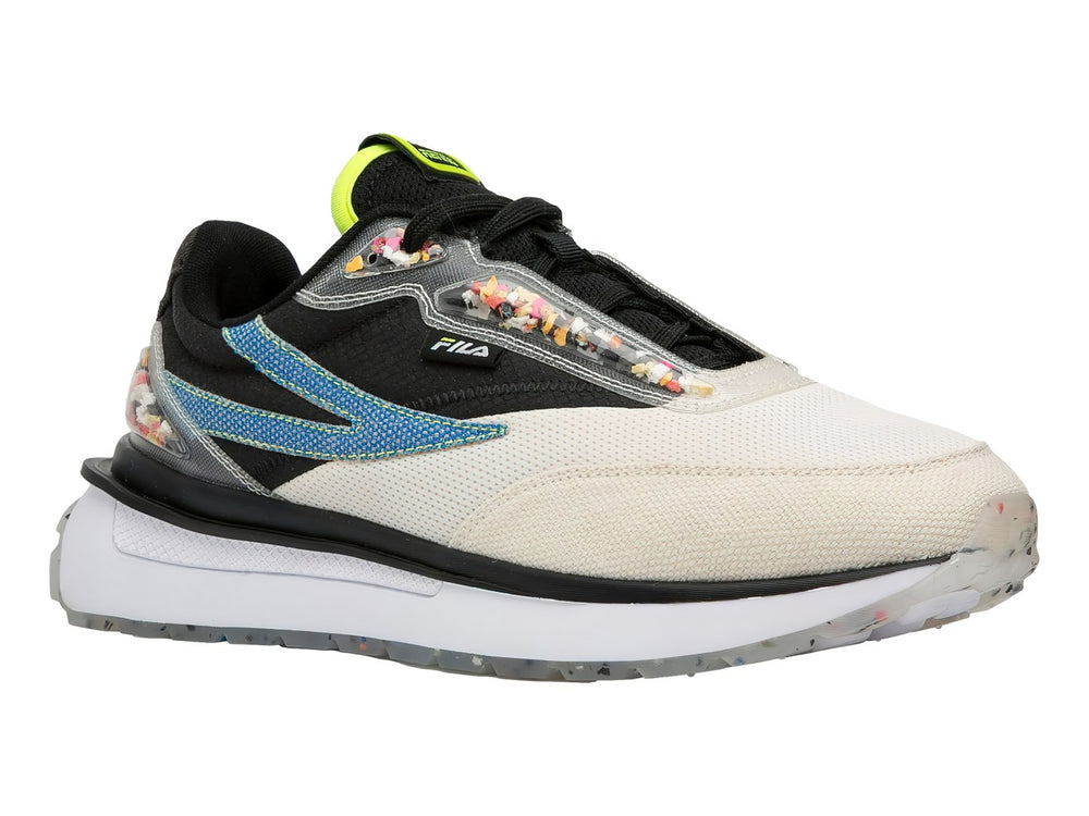 Tenis FILA en colores crema y negro con detalles azules y amarillos y suela blanca gruesa.