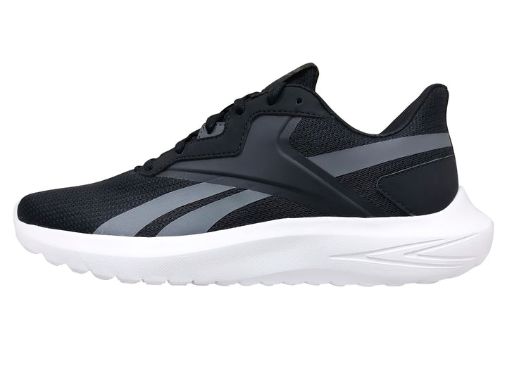 Tenis deportivos Reebok color negro con franjas grises y suela blanca.