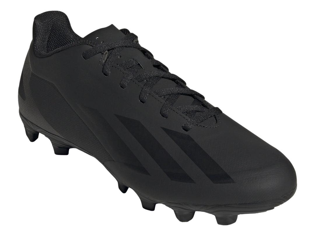 Calzado de fútbol Adidas Crazyfast en color negro total con tacos para pasto.