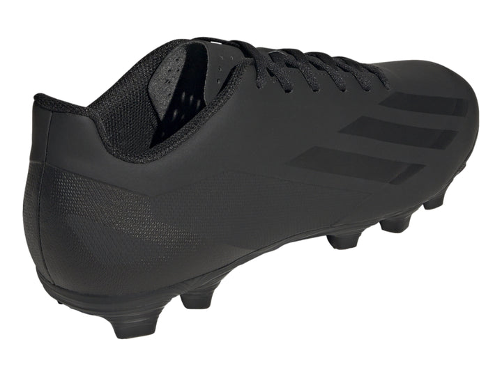 Calzado de fútbol Adidas Crazyfast en color negro total con tacos para pasto.