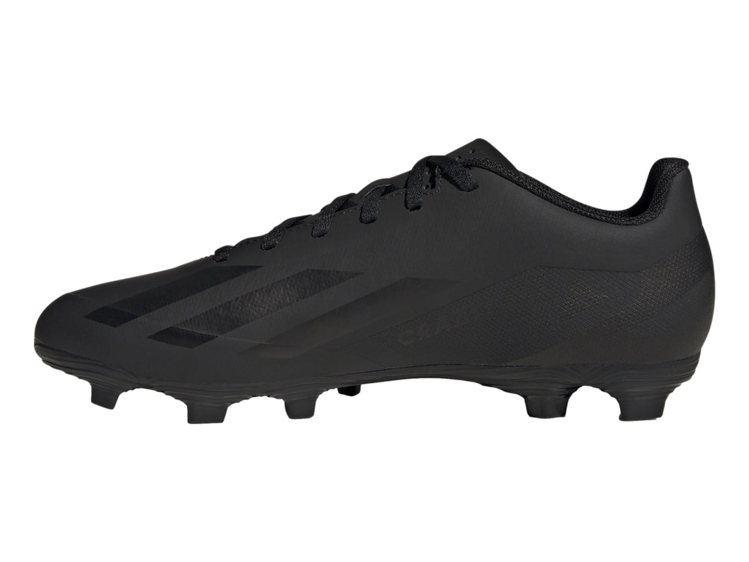 Calzado de fútbol Adidas Crazyfast en color negro total con tacos para pasto.