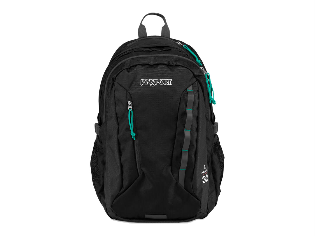 Mochila JanSport color negro con detalles en verde agave, diseño escolar y casual.