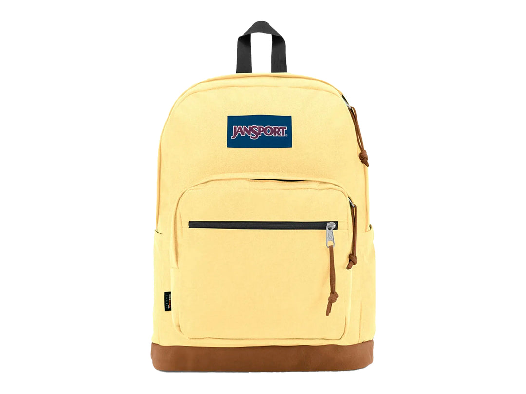 Mochila JanSport Right Pack en color amarillo pálido con base marrón y asa negra.