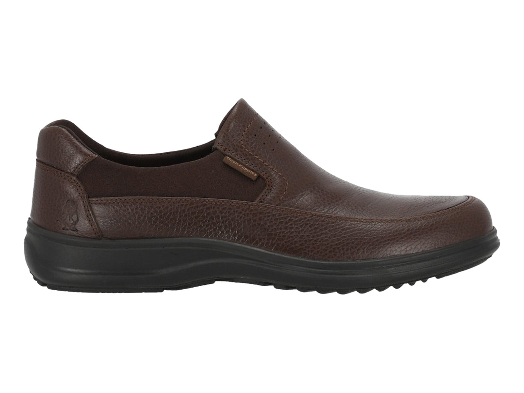 Zapato casual Hush Puppies modelo Bremen en cuero color marrón con suela negra, vista lateral.