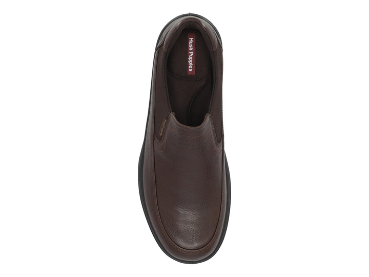 Zapato casual Hush Puppies modelo Bremen en cuero color marrón con suela negra, vista lateral.
