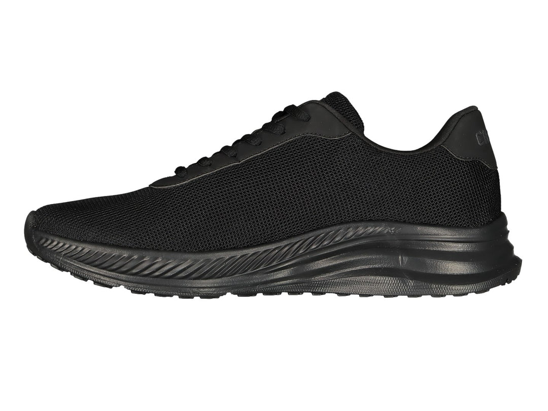 Par de tenis deportivos Charly color negro con malla transpirable y suela texturizada.