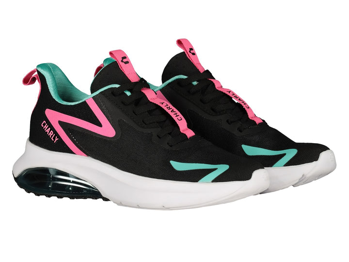 Par de tenis deportivos Charly en color negro con detalles en rosa y aqua, suela blanca con cámara de aire.