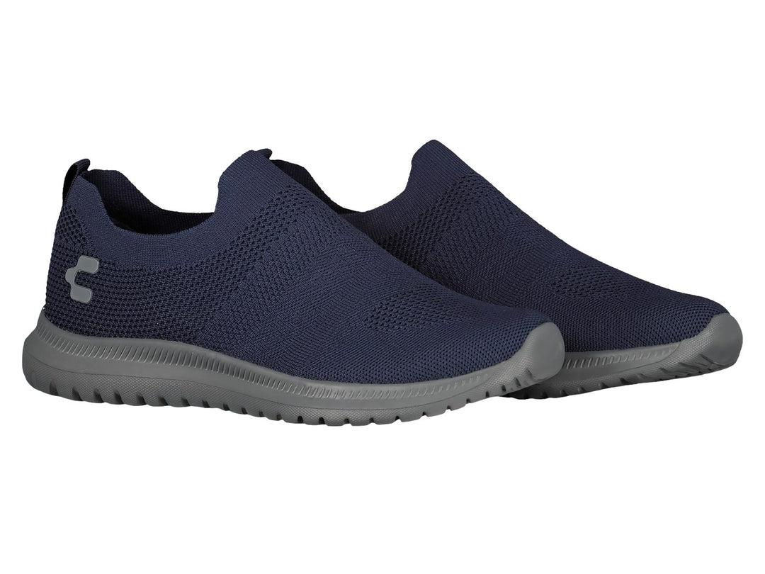 Par de tenis deportivos Charly color azul marino con suela gris, diseño slip-on sin agujetas en tela tejida.