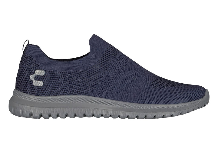 Par de tenis deportivos Charly color azul marino con suela gris, diseño slip-on sin agujetas en tela tejida.