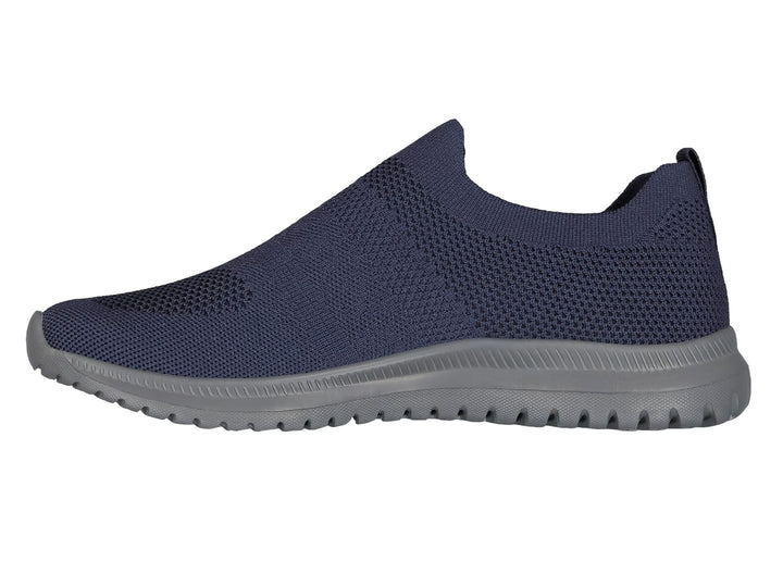 Par de tenis deportivos Charly color azul marino con suela gris, diseño slip-on sin agujetas en tela tejida.