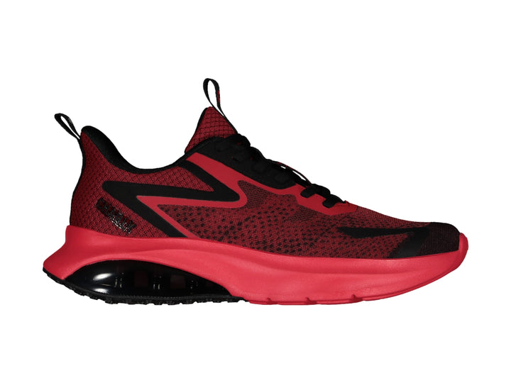 Tenis deportivos Charly en color rojo con detalles negros y suela amortiguada.