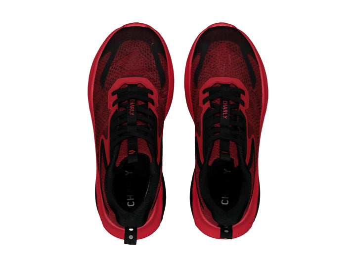 Tenis deportivos Charly en color rojo con detalles negros y suela amortiguada.