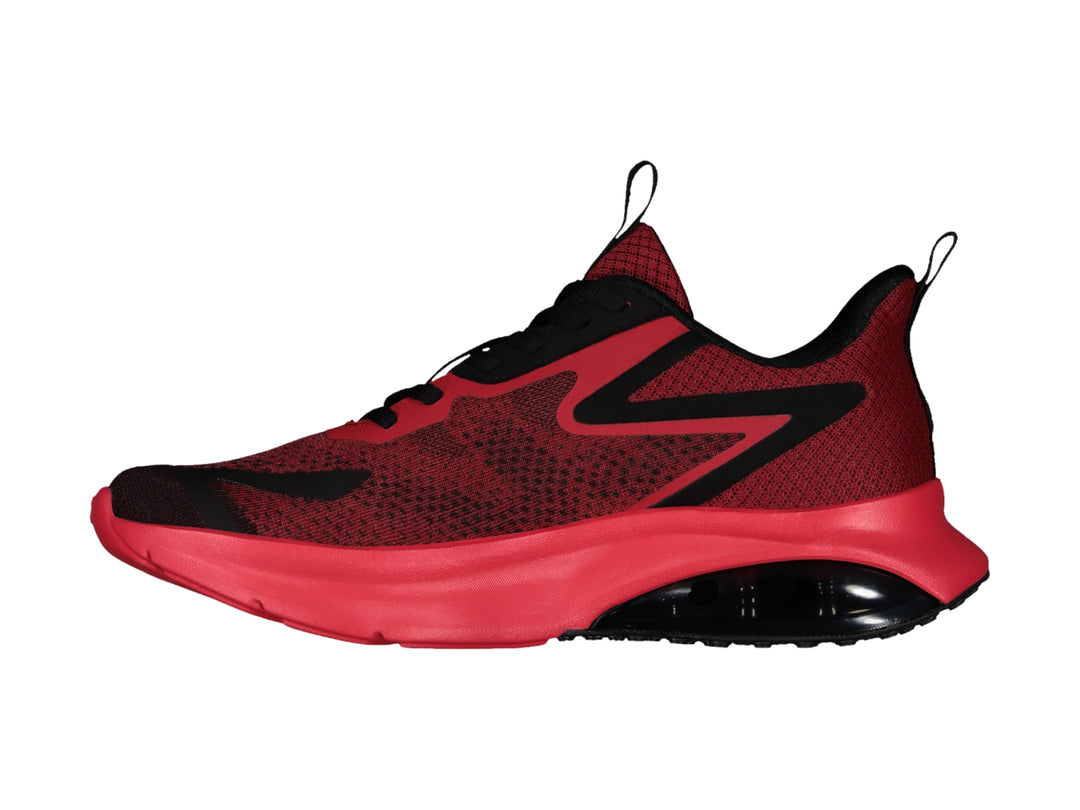 Tenis deportivos Charly en color rojo con detalles negros y suela amortiguada.
