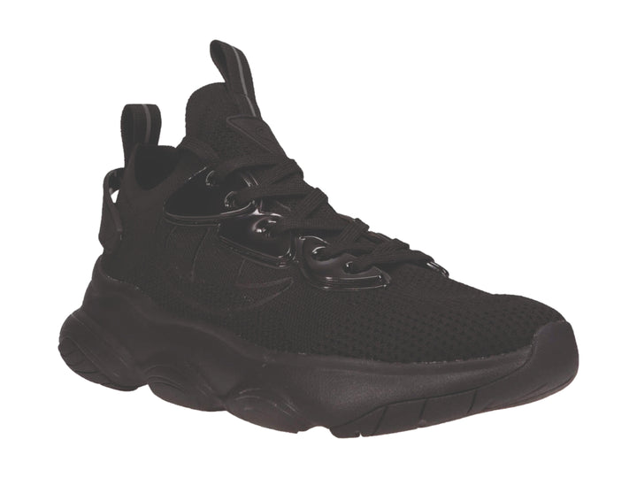 Tenis deportivos Champion color negro con suela gruesa y detalles en material sintético brillante.