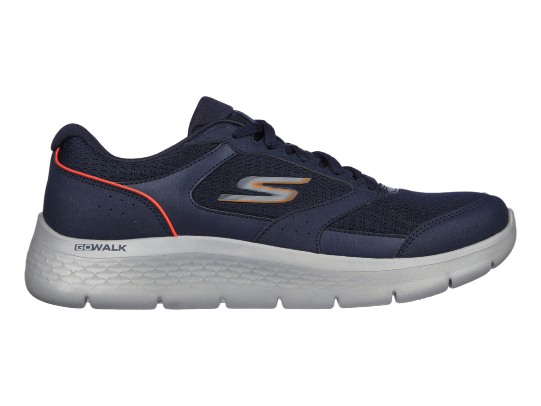 Tenis Skechers Go Walk Flex color azul marino con suela gris y detalles naranjas.