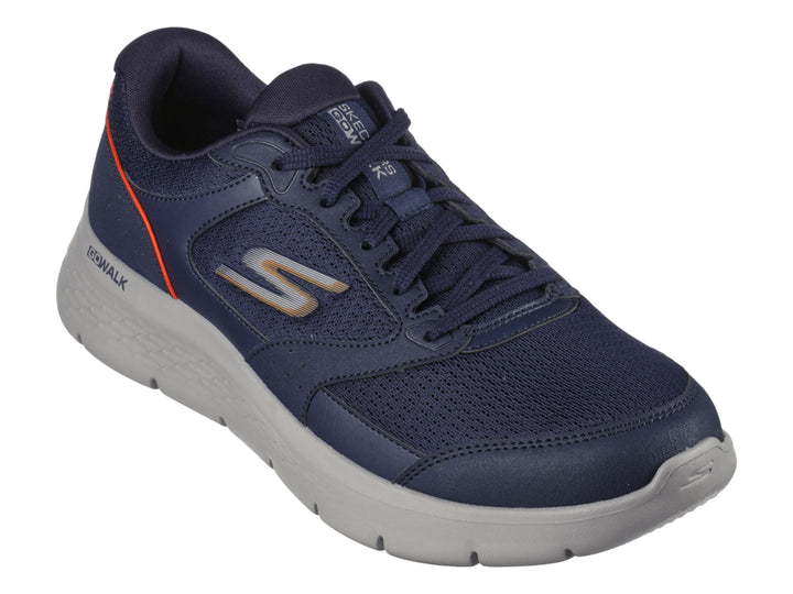 Tenis Skechers Go Walk Flex color azul marino con suela gris y detalles naranjas.