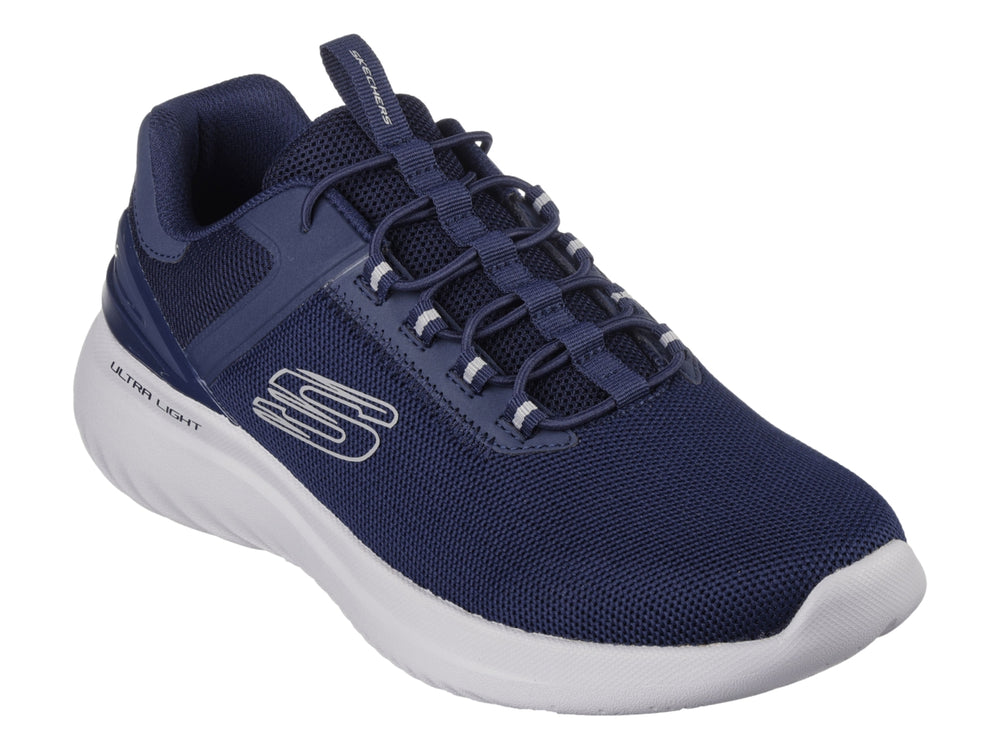 Tenis deportivos Skechers color azul marino con suela blanca y detalles en malla.