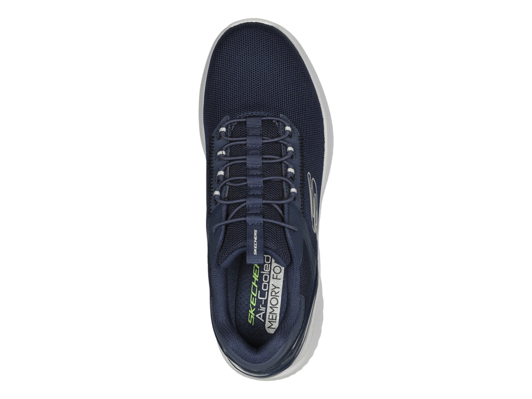 Tenis deportivos Skechers color azul marino con suela blanca y detalles en malla.