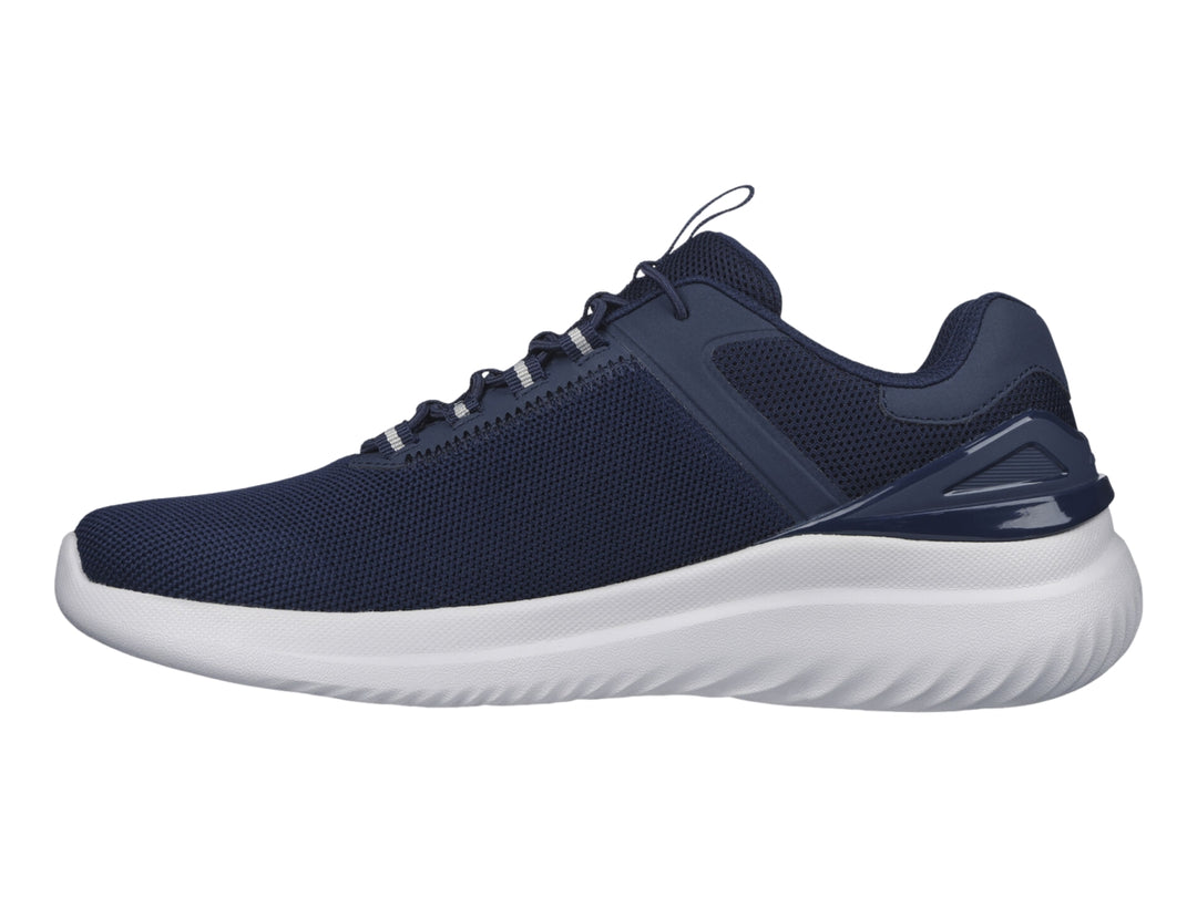 Tenis deportivos Skechers color azul marino con suela blanca y detalles en malla.