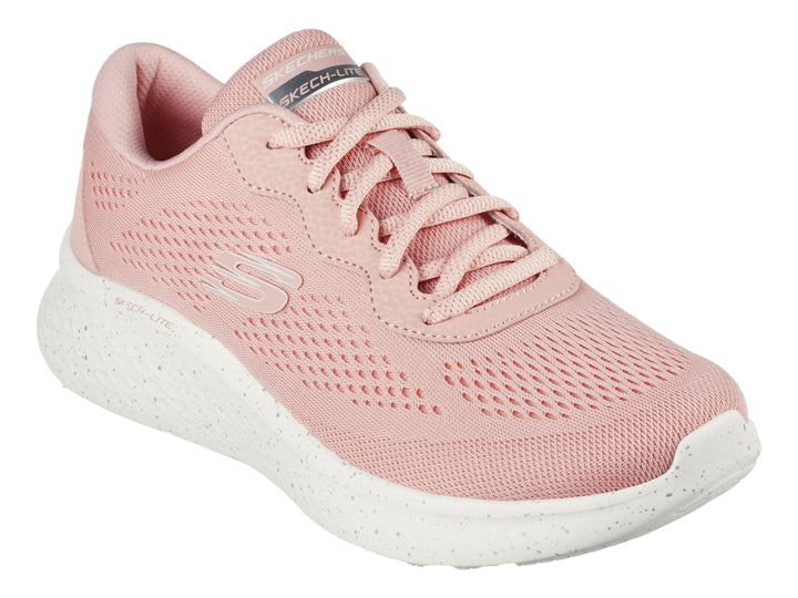 Tenis deportivos Skechers para mujer en color rosa con suela blanca y tejido transpirable.