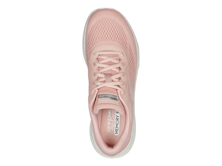 Tenis deportivos Skechers para mujer en color rosa con suela blanca y tejido transpirable.