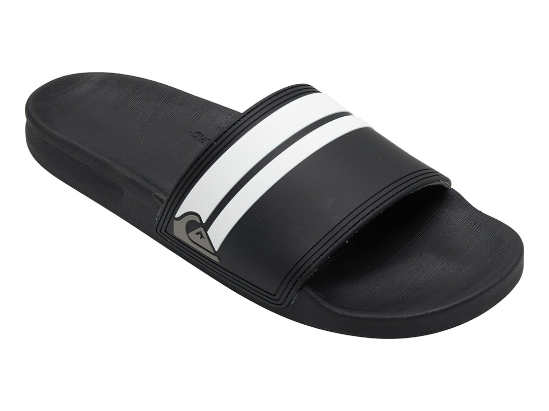Sandalia slide Quiksilver de color negro con dos franjas blancas laterales y suela negra.