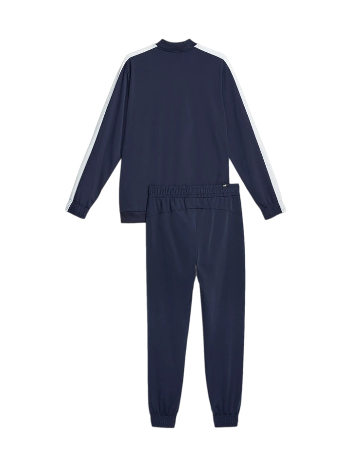 Conjunto deportivo PUMA azul marino con franjas blancas en los hombros, compuesto por chaqueta y pantalón.