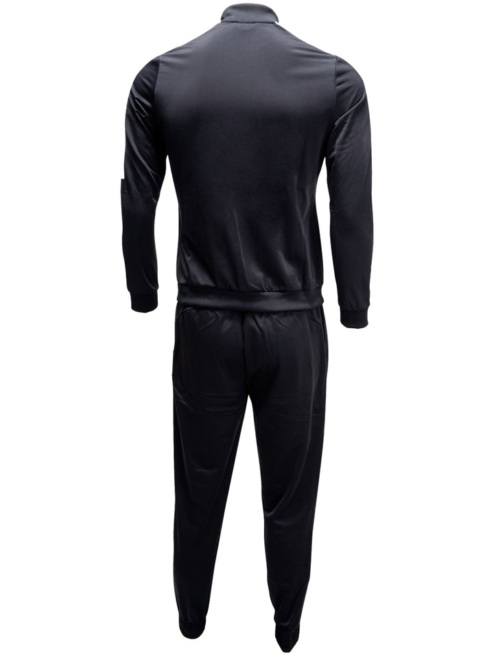 Conjunto deportivo PUMA de dos piezas en color negro, incluye chaqueta con cierre y pantalones.