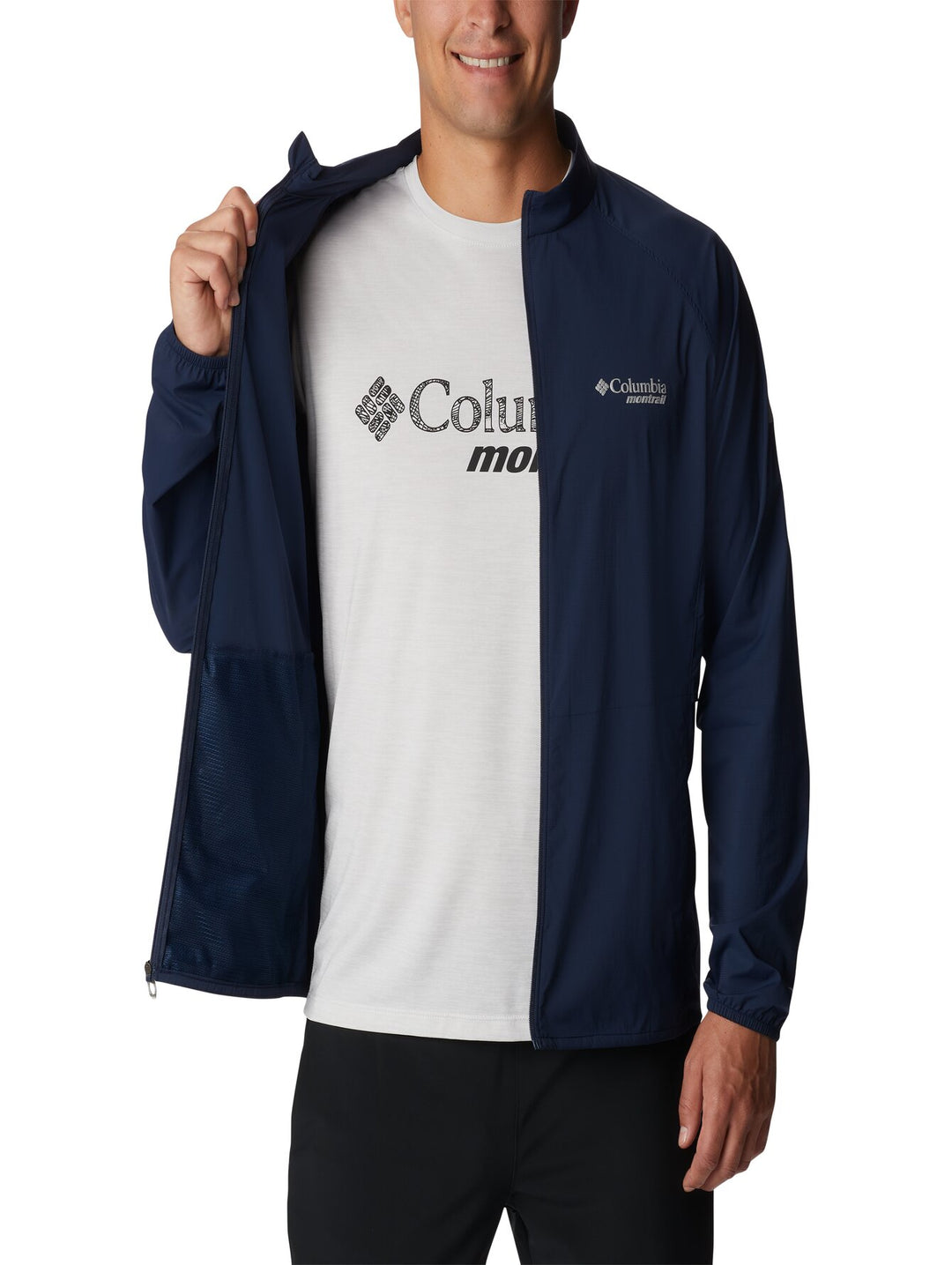 Chaqueta rompevientos Columbia color azul marino con cierre frontal y cuello alto.