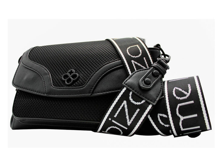 Bolso negro Jaime Ibiza con asa gruesa, correa ajustable y accesorio decorativo naranja.