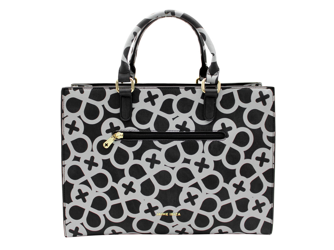 Bolso tote negro con estampado geométrico gris y detalles metálicos dorados.