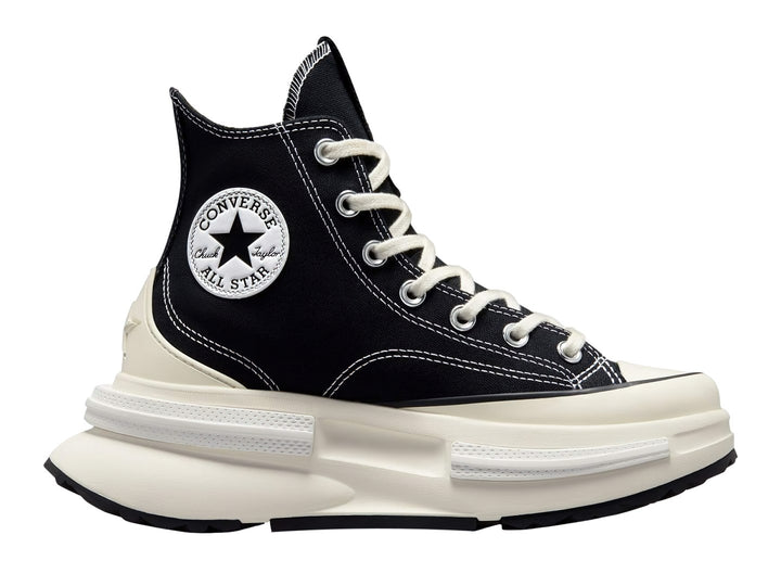 Tenis Converse Run Star Legacy CX color negro con suela blanca de plataforma elevada.