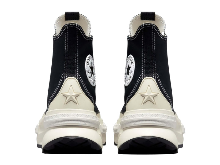 Tenis Converse Run Star Legacy CX color negro con suela blanca de plataforma elevada.