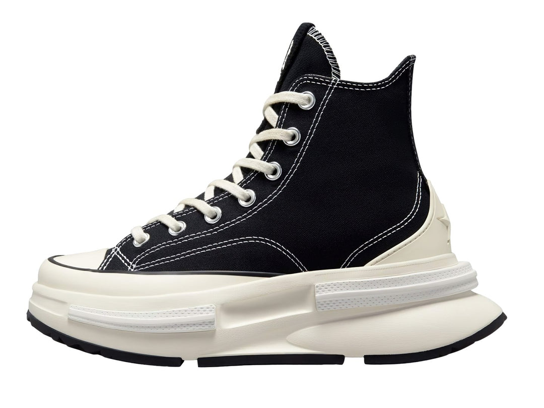 Tenis Converse Run Star Legacy CX color negro con suela blanca de plataforma elevada.