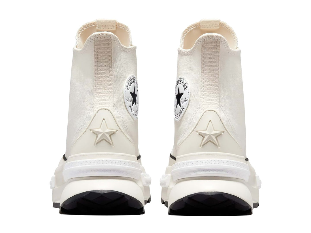Tenis Converse Run Star Legacy CX de bota en color crema con suela de plataforma blanca y negra.