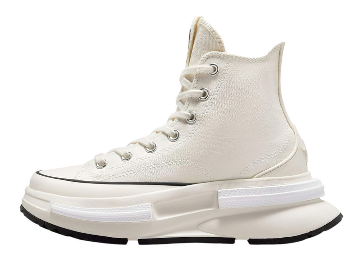 Tenis Converse Run Star Legacy CX de bota en color crema con suela de plataforma blanca y negra.