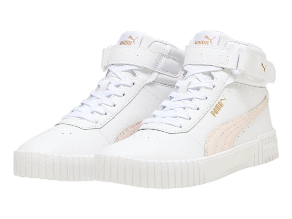 Tenis PUMA Carina 2.0 Mid en color blanco con detalles en rosa pastel y suela blanca ancha.