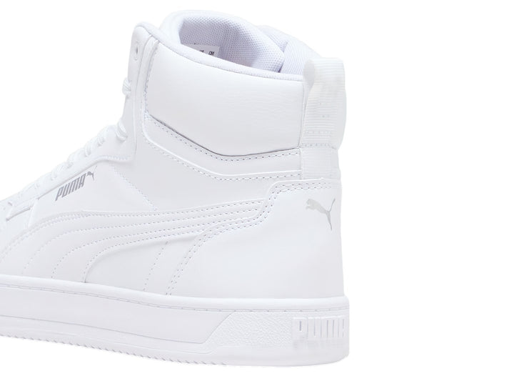 Tenis PUMA Caven 2.0 Mid en color blanco total, diseño de bota media con agujetas y suela blanca.