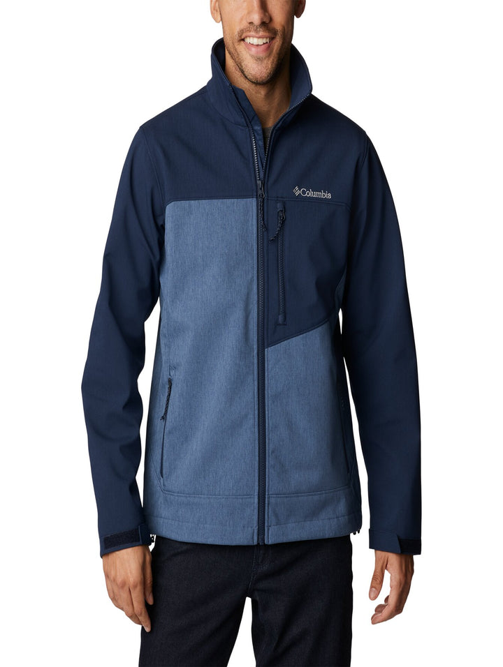 Chaqueta Columbia de dos tonos de azul con cierre frontal y cuello alto.