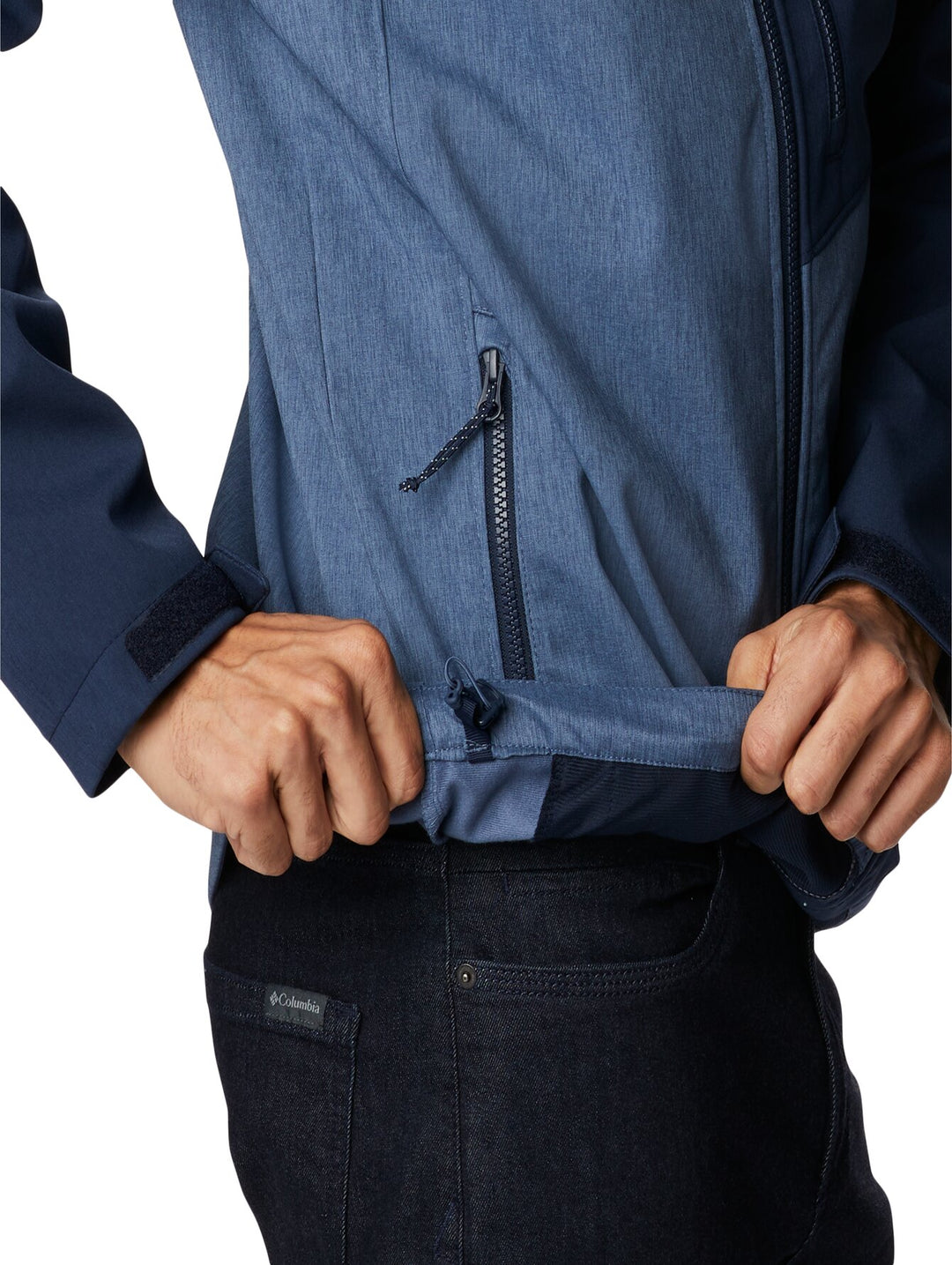 Chaqueta Columbia de dos tonos de azul con cierre frontal y cuello alto.