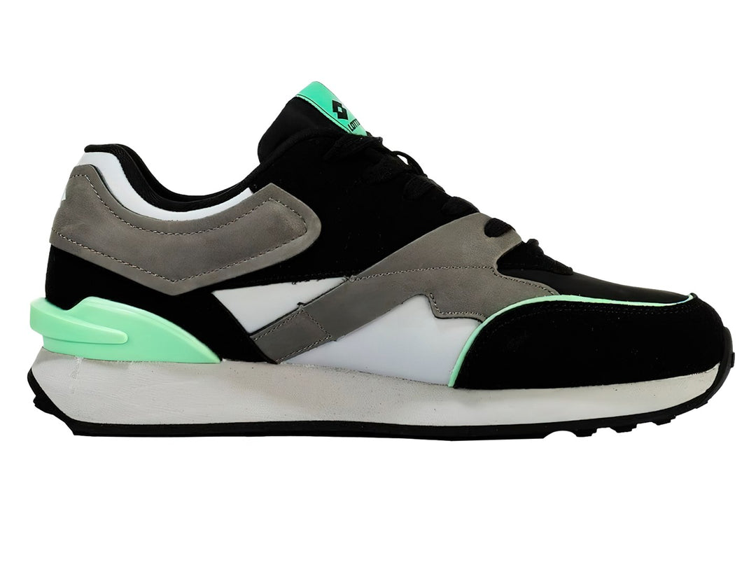 Tenis deportivos Lotto en colores negro, blanco y gris con detalles en verde menta.
