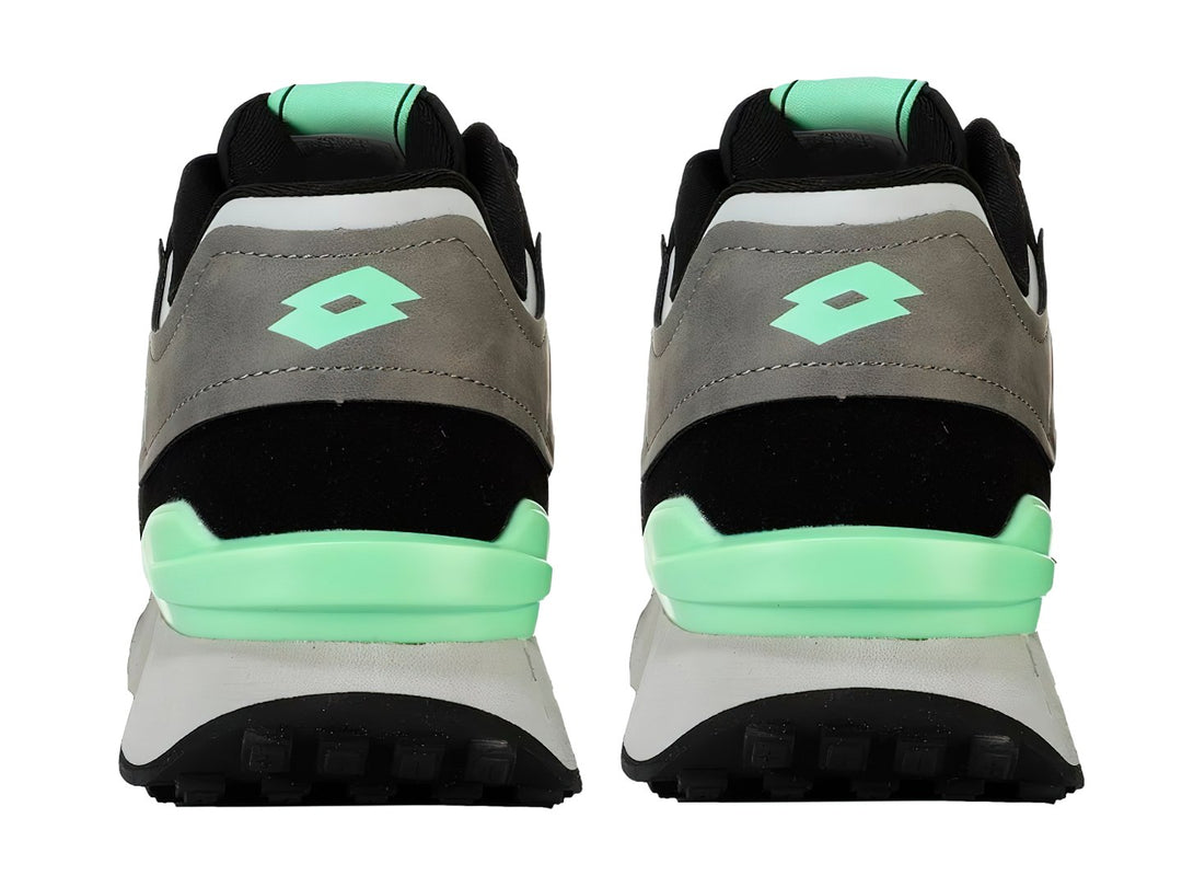 Tenis deportivos Lotto en colores negro, blanco y gris con detalles en verde menta.