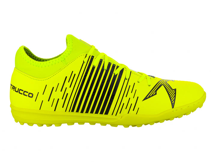 Zapato de fútbol Leon Trucco color amarillo neón con rayas negras y suela para pasto sintético.