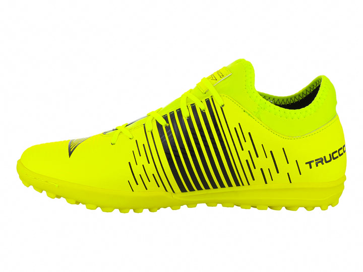 Zapato de fútbol Leon Trucco color amarillo neón con rayas negras y suela para pasto sintético.