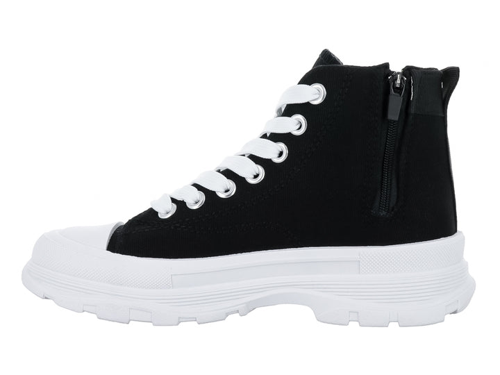 Tenis botín Lotto color negro con suela blanca gruesa y cordones blancos.