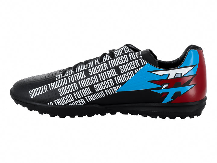 Zapato de fútbol Leon Trucco color negro con gráficos en azul y rojo, suela para turf.