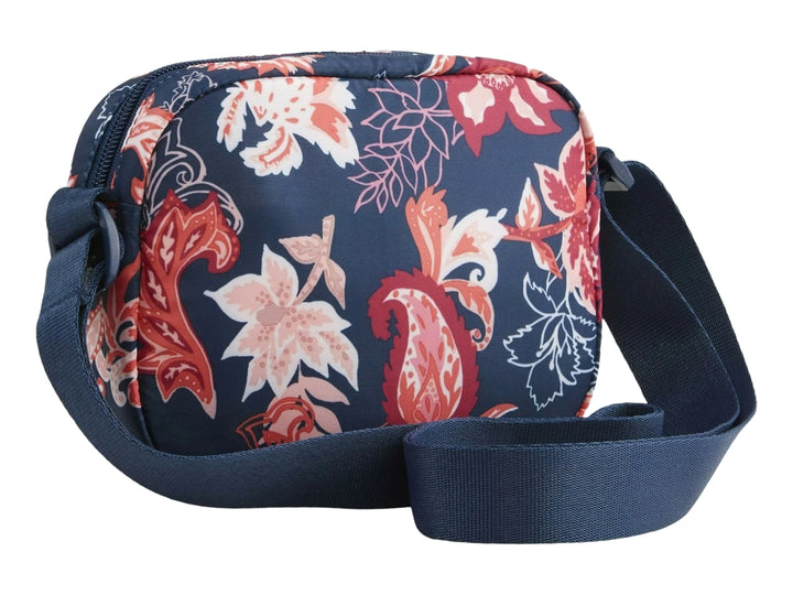 Bolso bandolera PUMA circular con estampado floral en tonos azul y rojo sobre fondo azul oscuro.